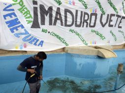 En la ciudad de San Cristóbal, se registraron el martes pasado manifestaciones callejeras contra la crisis económica. AFP / J. Barreto