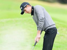 Carlos Ortiz reconoció que para poder aspirar al título en este torneo deberá retomar la confianza en su juego. AFP / T. Warshaw