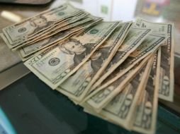 El Banxico informó que el tipo de cambio para solventar obligaciones en moneda extranjera es de 14.9553 pesos. EL INFORMADOR / ARCHIVO