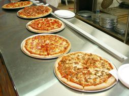 Piden evitar el consumo excesivo de comida rápida como pizzas y hamburguesas. EL INFORMADOR / ARCHIVO