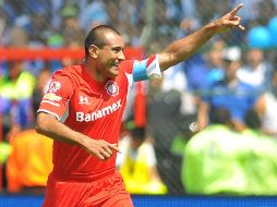 Los Escarlatas llevan la ventaja de 4-3 ante la Franja. AFP / ARCHIVO