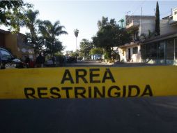 Aunque se cree que el móvil fue el robo, el vehículo del funcionario fue abanadonado calles abajo. EL INFORMADOR / ARCHIVO