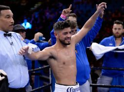 Abner cumplió la promesa de presentarse en 2015 con triunfo. AFP / H. How