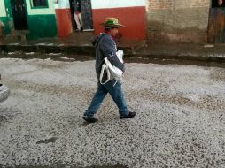 Los vecinos de la zona vieron sus calles cubiertas de blanco en pocos minutos. ESPECIAL / Bomberos de Tlajomulco