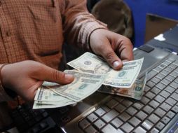 El Banxico fijó el tipo de cambio en 15.4003 pesos por dólar. EL INFORMADOR / ARCHIVO