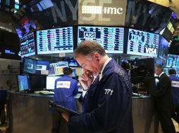 Por su parte, Nasdaq cerró con un ascenso de 43.35 puntos. AFP / S. Platt