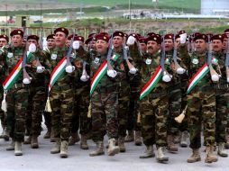 Unos 600 cristianos participaron en la formación, con un entrenamiento físico, cursos de arte militar y ejercicios de tiro. AFP / S. Hamed