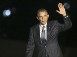 Obama cuenta su rutina matinal y se pone de pie suscitando la risa de la importante audiencia política. EFE / A.  Guerrucci