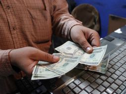 El Banxico fijó el tipo de cambio para solventar obligaciones en moneda extranjera en 15.4271. EL INFORMADOR / ARCHIVO