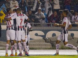Jugadores del Monterrey celebran el pase a la siguiente etapa del torneo. MEXSPORT / E. de la Torre