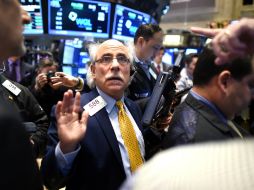 El tecnológico Nasdaq llegó a superar los cinco mil puntos aunque en los últimos compases de la sesión se desinflaron esas subidas. AFP / T. Clairy