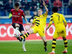 Con la victoria, el Dortmund tiene ya 33 puntos, lo cual lo sitúa cinco puntos por debajo del sexto lugar ocupado por el Augsburgo. AFP / P. Steffen