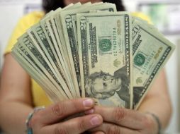 El Banxico informa que el tipo de cambio para solventar obligaciones en moneda extranjera es de 14.9347 pesos. EL INFORMADOR / ARCHIVO