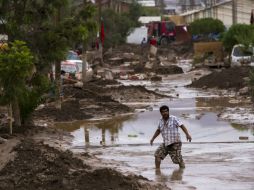 El temporal, que provocó inundaciones y aluviones, afectó desde el pasado martes a varias regiones. AFP / P. Miranda