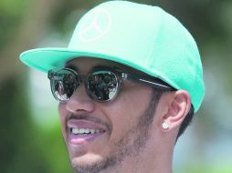 MILLONARIO. Desde noviembre del año pasado Hamilton comenzó a negociar nuevo contrato con Mercedes. AFP / M. Rasfan