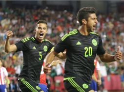 Eduardo Herrera (der.) celebra su golazo anotado al minuto 2 del partido. NTX / O. Vega