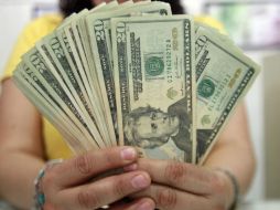 Expectativa de menor crecimiento irá de la mano con una depreciación mayor del peso mexicano frente al dólar estadounidense. EL INFORMADOR / ARCHIVO