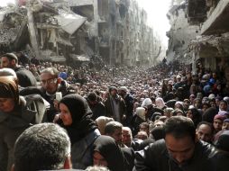Miles de Palestinos refugiados habitan el campamento de Yarmuk, tomado ahora por el Estado Islámico. EFE / Y. Badawi