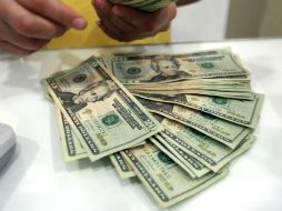 El Banxico fijó en 14.8003 pesos el tipo de cambio para solventar obligaciones. EL INFORMADOR / ARCHIVO