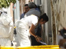 Después del ataque, los agresores bajaron de una camioneta para dejar una cartulina con amenazas hacia las autoridades. EL INFORMADOR / ARCHIVO