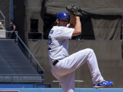 Clayton Kershaw, de los Dodgers, gana 31 millones de dólares al año. AP / M. Terrill