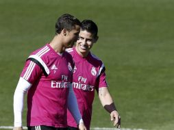 Galácticos renovados. Cristiano marcó cinco goles y James volvió a jugar el domingo ante el Granada. EFE / J. Guillén