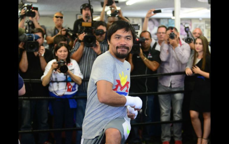 El 'Pacman' Pacquiao llega a esta pelea, a sus 35 años, con marca de 57-5-2 (38 por la vía rápida). AFP / F. Brown