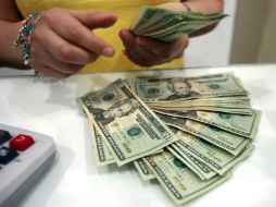 Durante la sesión de este jueves se espera que el tipo de cambio cotice entre 15.09 y 15.40 pesos por dólar. EL INFORMADOR / ARCHIVO