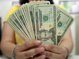 El Banxico fijó el tipo de cambio para solventar obligaciones en 15.3973 pesos. EL INFORMADOR / ARCHIVO