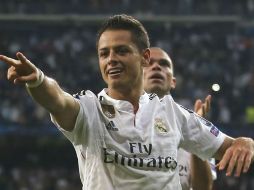 'Chicharito' festeja el gol que dio el pase a semifinal de Champions. AP / P. White