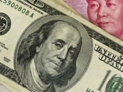 El tipo de cambio para solventar obligaciones denominadas en moneda extranjera es de 15.3834 pesos. EFE / ARCHIVO