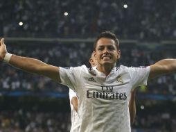 Uno de los mariachis pide que el ariete mexicano se quede en el equipo merengue. AP / ARCHIVO