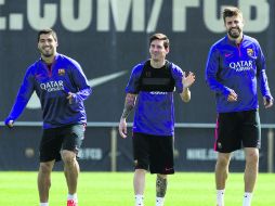 Luis Suárez, Lionel Messi y Gerard Piqué serían titulares ante el Espanyol. EFE / A. García
