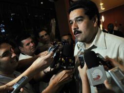 El jefe de Estado venezolano recibe un mensaje por parte de la mujer en un mango. NTX / ARCHIVO