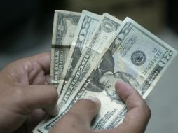 El Banxico señaló que el tipo de cambio para solventar obligaciones en 15.2225 pesos. EL INFORMADOR / ARCHIVO