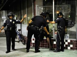 El Departamento de Justicia de EU encuentra un patrón de uso excesivo de la fuerza contra negros e hispanos. AFP / ARCHIVO