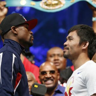 Mayweather y Pacquiao superan la báscula