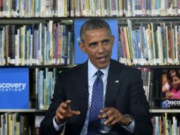 Obama busca aprobar las dos nuevas iniciativas que propone, para el acceso de jóvenes a bibliotecas y dotarlos de equipo electrónico. AP / S. Walsh