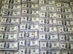 El tipo de cambio para solventar obligaciones en moneda extranjera es de 15.4940 pesos. NTX / ARCHIVO