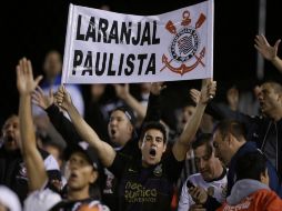 Seguidores del Corinthians apoyan a su equipo durante un partido de la Copa libertadores contra Paraguay. AP / J. Saenz