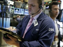 La jornada inició con pérdidas y al final remonta la tendencia y cierra positivo. AP / R. Drew