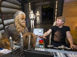 La muestra cuenta con 16 figuras de cera de los héroes y villanos en las escenas más icónicas de la saga de seis películas. AFP / J. Tallis