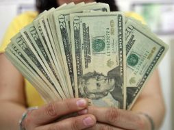 El Banxico informa que el tipo de cambio para solventar obligaciones es de 15.2008 pesos. EL INFORMADOR / ARCHIVO