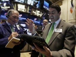 Wall Street se recuperó durante la jornada, pues abrió con número rojos este 20 de mayo. AP / R. Drew