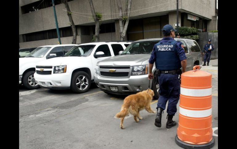 Tras los ataques, ambos inmuebles son resguardados por elementos federales. AFP / ARCHIVO