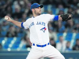 Rogers Centre. Marco Estrada realiza uno de sus lanzamientos durante el juego de ayer por la noche. AFP / .T. Szczerbowski