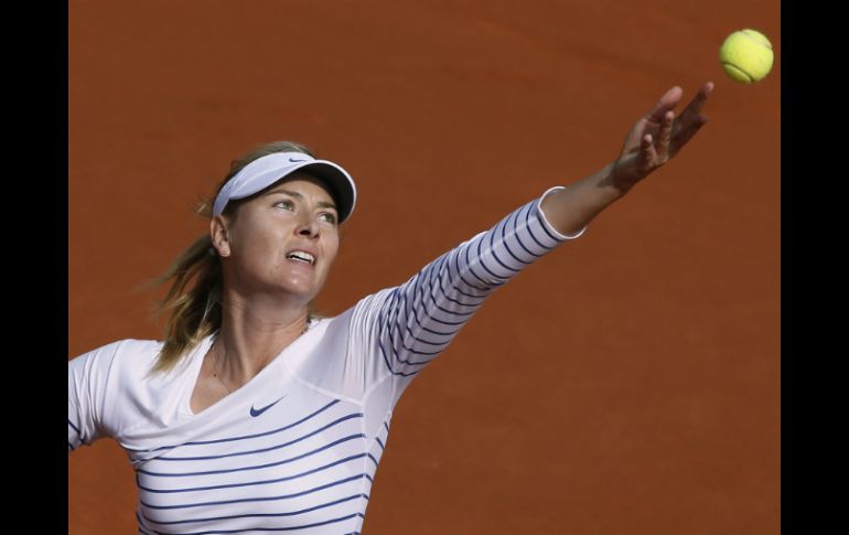 Kanepi jugó sus mejores minutos e igualó 3-3, pero Sharapova se repuso y logró el partido tras una doble falta de su rival. AFP / P. Kovarik