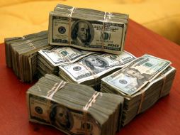 El Banxico informó que el tipo de cambio para solventar obligaciones es de 15.3235 pesos. EL INFORMADOR / ARCHIVO