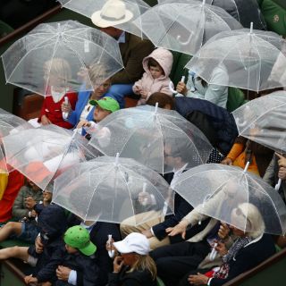 Aplazan por lluvia juegos de Sharapova y Muguruza