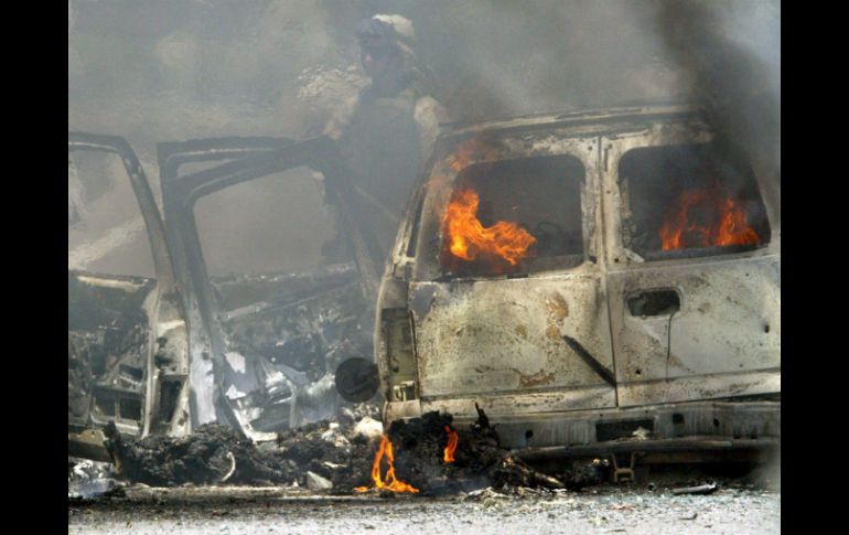 Peralta recibió un un disparo letal en la cabeza y mortalmente herido, cubrió una granada con su cuerpo para salvar a sus colegas. EFE / ARCHIVO